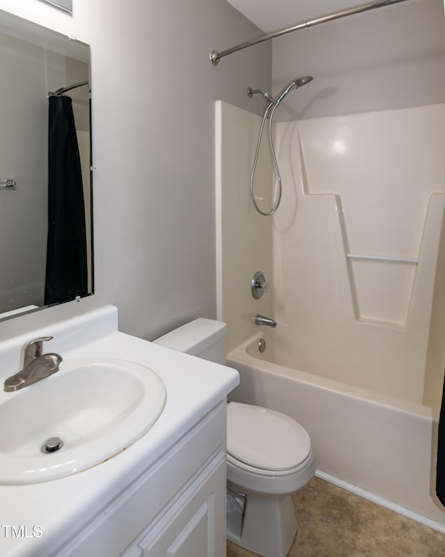 full bathroom with vanity, shower / bath combo with shower curtain, and toilet