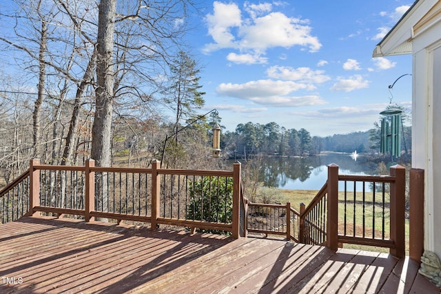 wooden deck with a water view