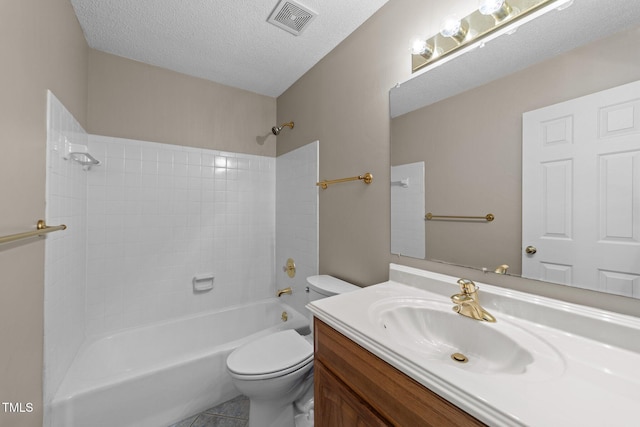 bathroom with visible vents, toilet, tub / shower combination, a textured ceiling, and vanity