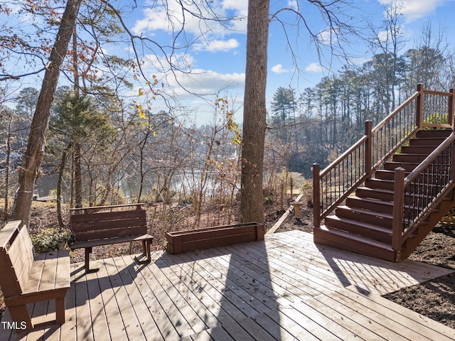 wooden terrace featuring stairway