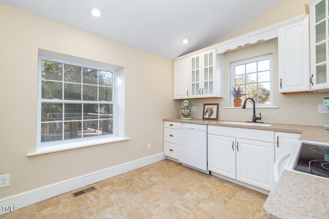 kitchen featuring vaulted ceiling, white cabinetry, sink, white dishwasher, and electric stove