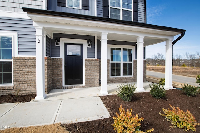 property entrance with a porch