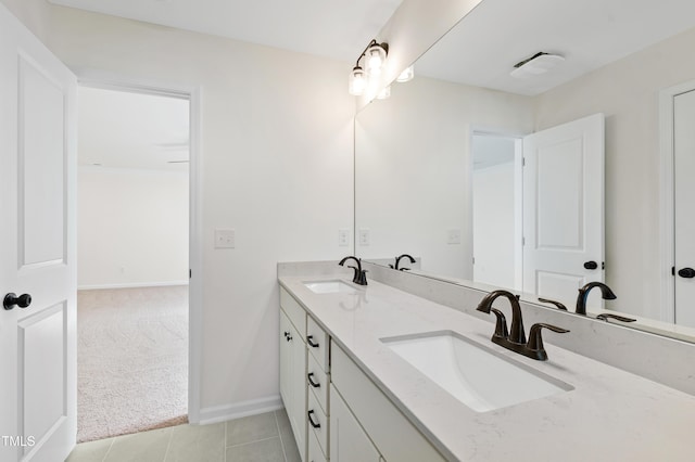 bathroom featuring vanity and tile patterned flooring