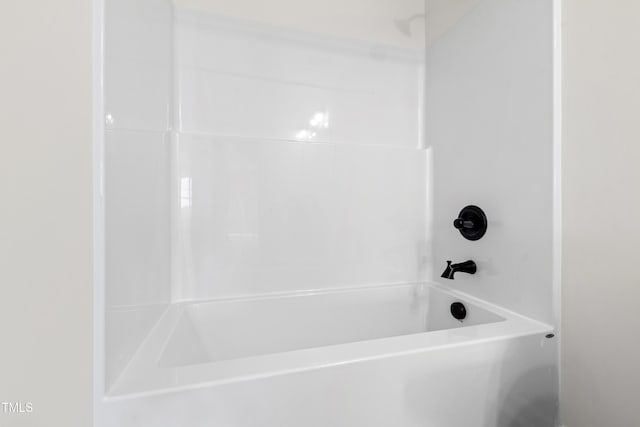 bathroom with shower / tub combination