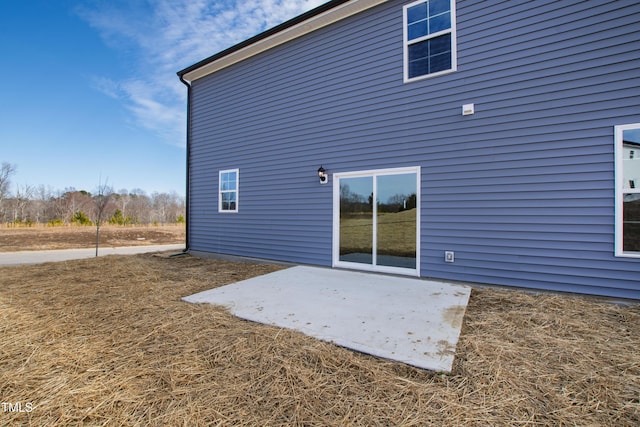 rear view of property with a patio