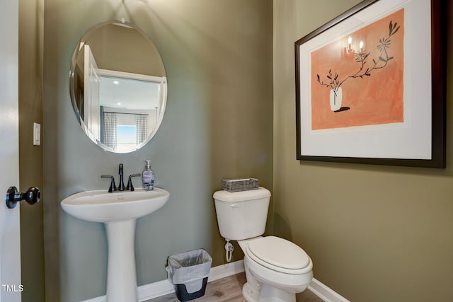 bathroom with sink and toilet