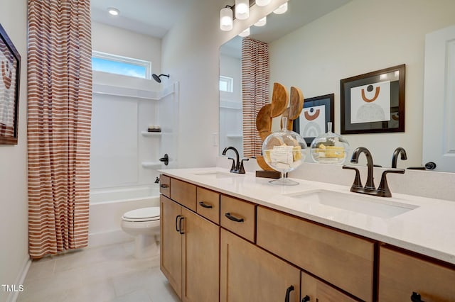 full bathroom with vanity, tile patterned floors, shower / bath combination with curtain, and toilet