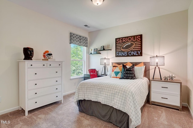 bedroom featuring carpet