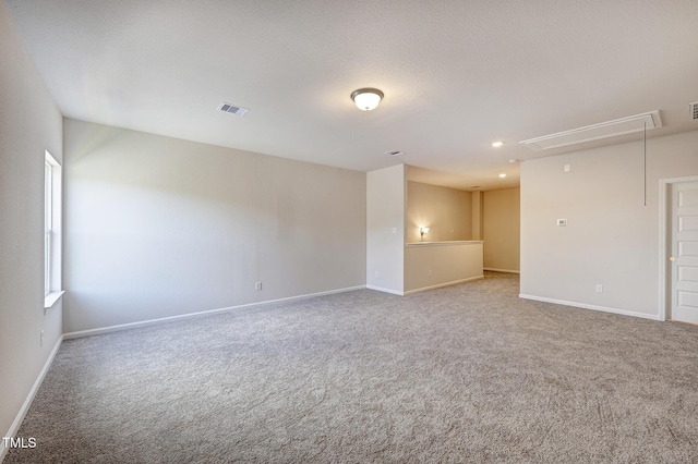 unfurnished room featuring carpet floors