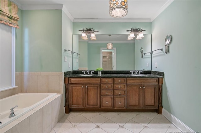 bathroom featuring crown molding, tile patterned floors, vanity, and tiled bath