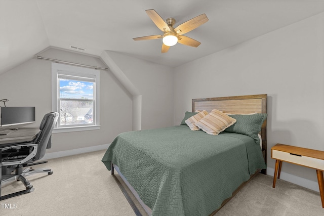 carpeted bedroom with lofted ceiling and ceiling fan