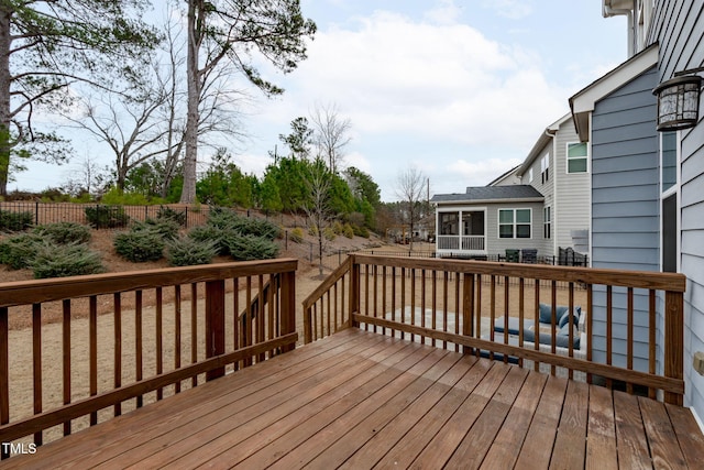 deck featuring a sunroom