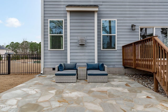 view of patio / terrace with a wooden deck and an outdoor hangout area