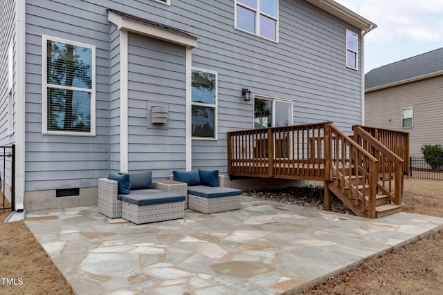 back of property with a patio, outdoor lounge area, and a deck