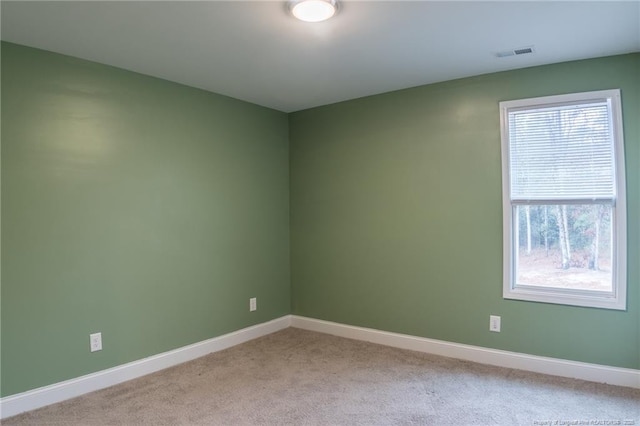 view of carpeted spare room