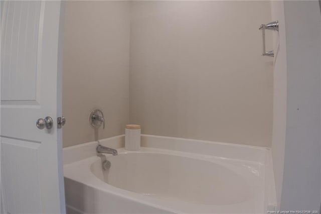 bathroom featuring a tub