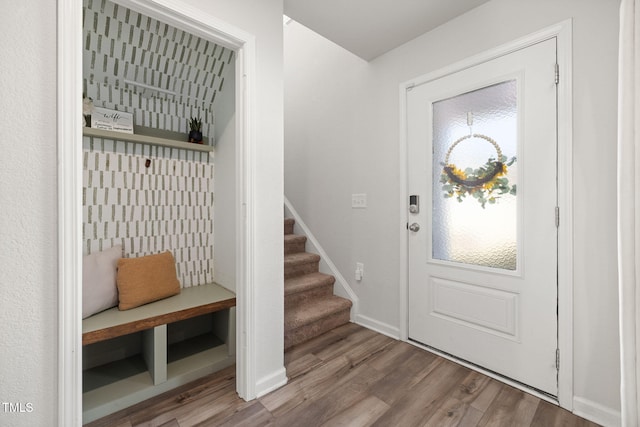 mudroom with light hardwood / wood-style flooring