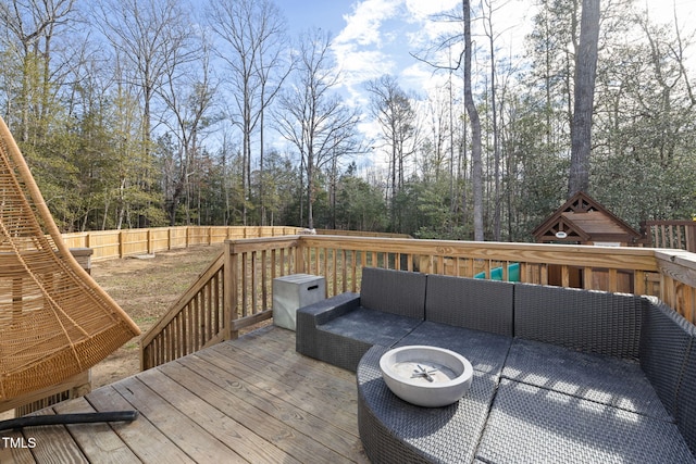 wooden deck with outdoor lounge area