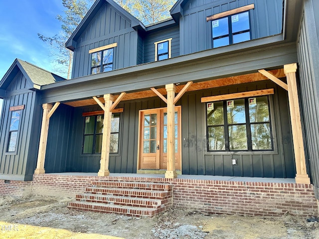 entrance to property with a porch