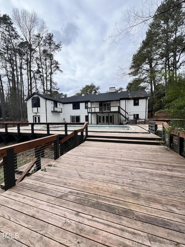 dock area featuring a swimming pool side deck