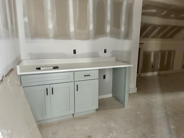 bathroom with concrete flooring