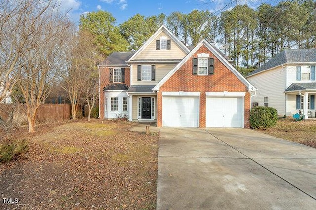 view of front of property with a garage