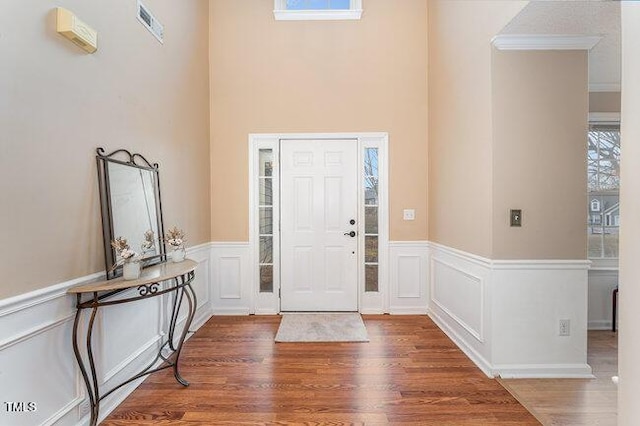 entrance foyer featuring dark hardwood / wood-style flooring