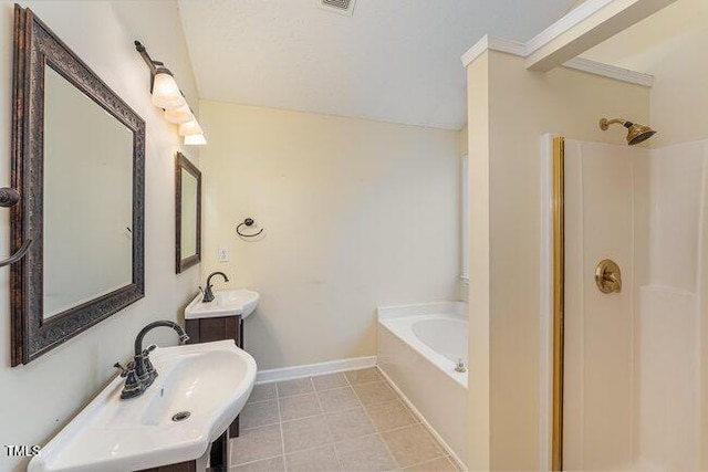 bathroom with vanity, independent shower and bath, and tile patterned flooring