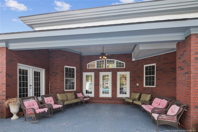 exterior space with an outdoor living space, french doors, and ceiling fan