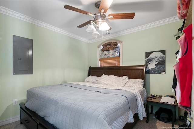 bedroom featuring ornamental molding, electric panel, ceiling fan, and carpet flooring