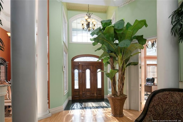 5304 Pineview Rd, Lumberton, NC 28360 - foyer entrance featuring plenty of natural light, a chandelier, a towering ceiling, and wood finished floors