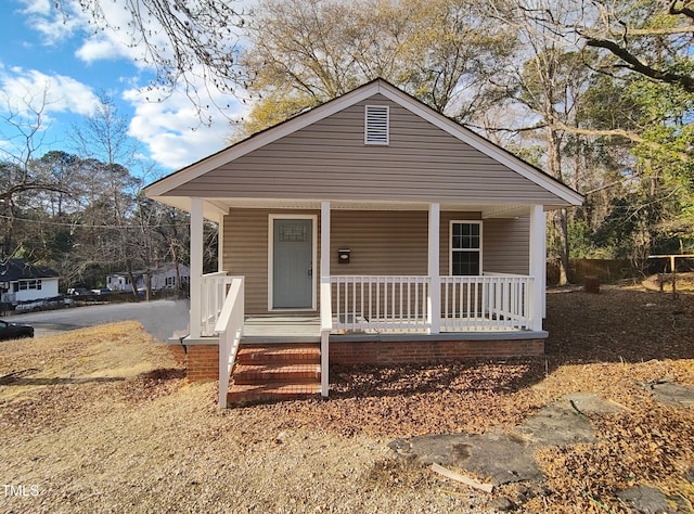 bungalow-style house with covered porch