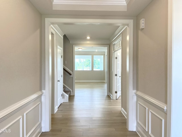82 N Stagecoach Dr, Wendell, NC 27591 - corridor featuring crown molding, wood finished floors, and stairway