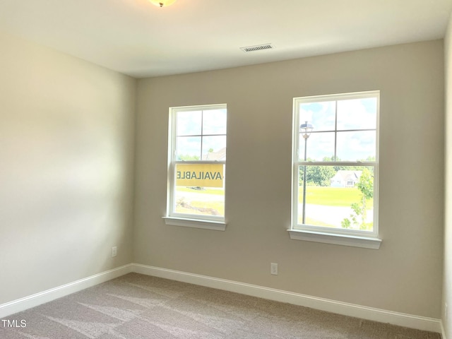 82 N Stagecoach Dr, Wendell, NC 27591 - unfurnished room featuring light carpet and plenty of natural light