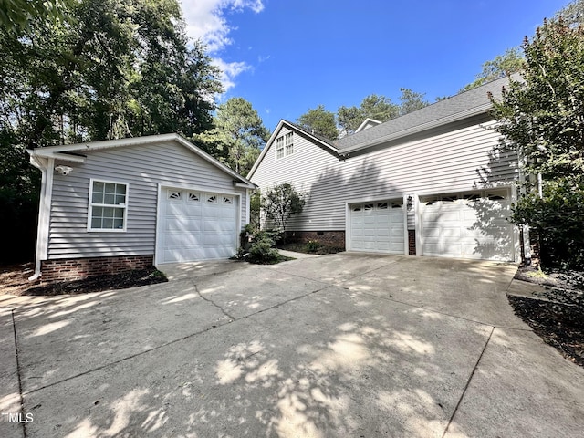 2934 Appaloosa Ct, Graham, NC 27253 - view of property exterior with driveway and crawl space