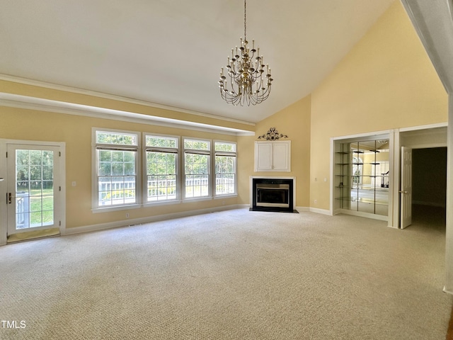 2934 Appaloosa Ct, Graham, NC 27253 - unfurnished living room featuring baseboards, light carpet, a chandelier, a fireplace with flush hearth, and high vaulted ceiling