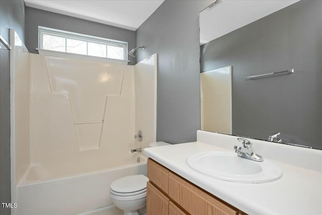 full bathroom with shower / tub combination, vanity, and toilet