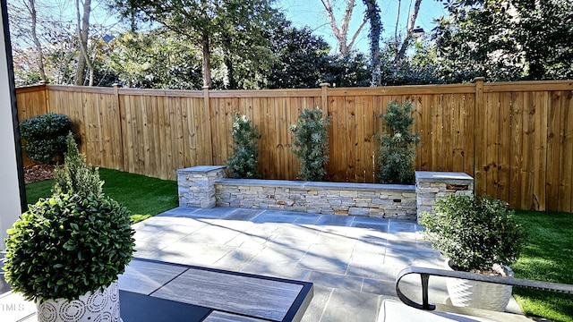 view of patio with a fenced backyard