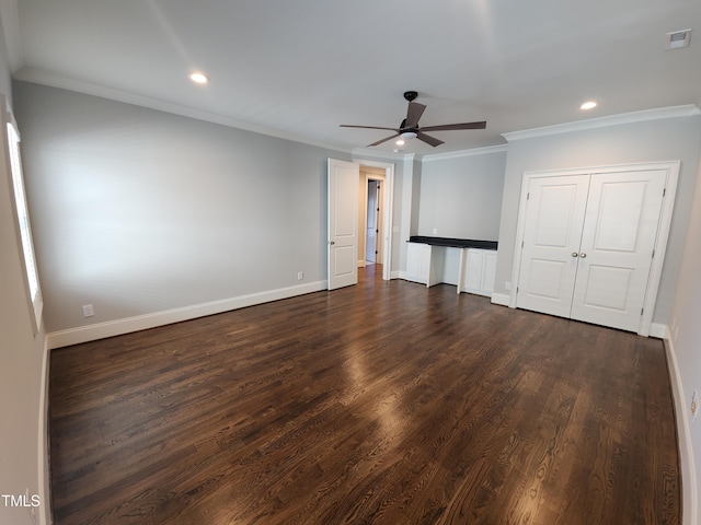 interior space featuring baseboards, visible vents, dark wood finished floors, ornamental molding, and recessed lighting