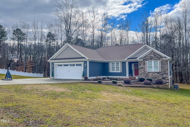 view of front of house featuring a garage and a front lawn