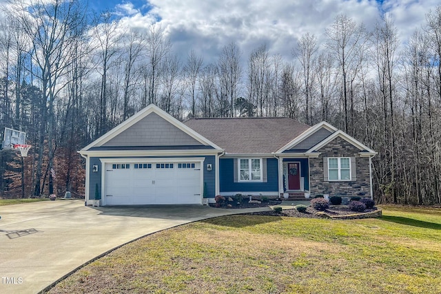 view of front facade with a garage and a front lawn