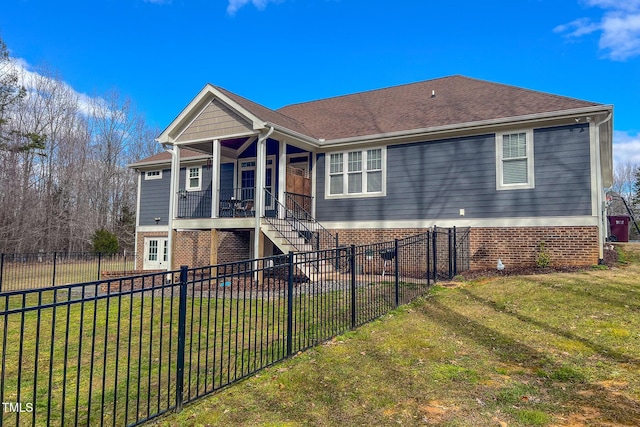 view of front of home featuring a porch and a front lawn