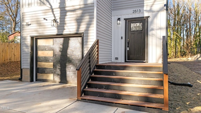 doorway to property featuring a garage