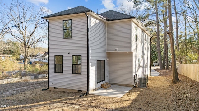 back of property with central AC unit