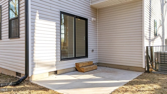 property entrance with a patio