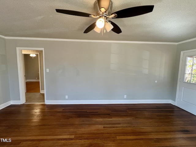 unfurnished room with crown molding, dark hardwood / wood-style floors, and a textured ceiling