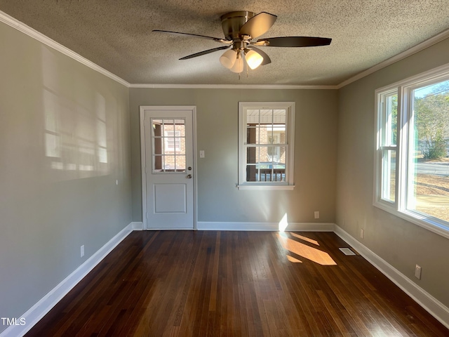 foyer entrance with crown molding, ceiling fan, dark hardwood / wood-style floors, and a textured ceiling