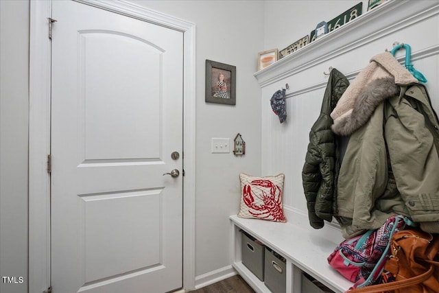 mudroom with dark wood-style floors