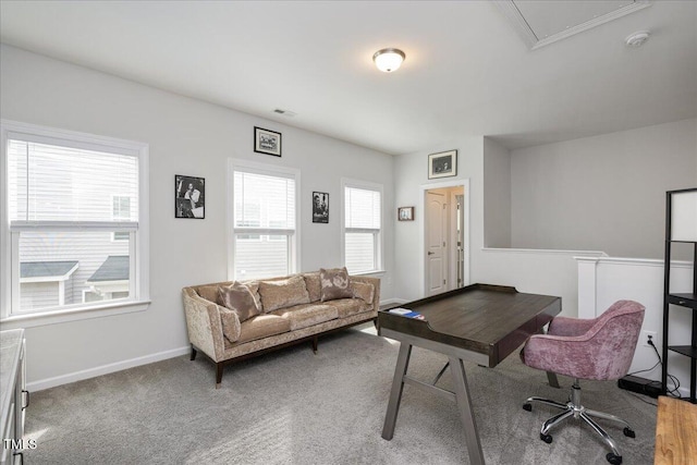 carpeted office featuring baseboards and visible vents