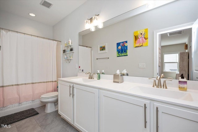 full bath featuring a sink, visible vents, and toilet